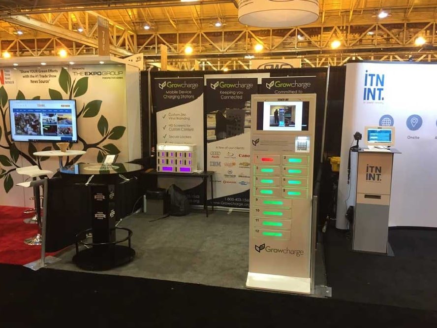 The Rockstar cellphone charging station at a trade show booth.